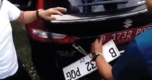 Viral! Oknum ASN DKI Ganti Plat Mobil Dinas Jadi Pribadi, Dihentikan Polisi di Bogor