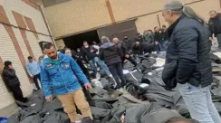 Kantong jenazah di luar Pusat Medis Forensik Kahrizak, Teheran, terkait korban gelombang protes nasional di Iran.