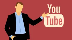 Logo YouTube berwarna merah dan putih terpampang di layar, melambangkan dominasi platform video dalam ekonomi kreator global.