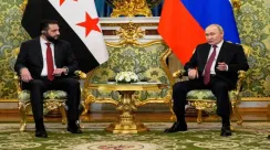 Vladimir Putin bertemu Presiden Suriah Ahmed al-Sharaa di Kremlin, Moskow.