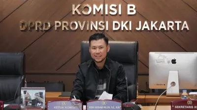 komisi-b