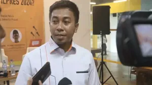 pengamat-politik-iwan