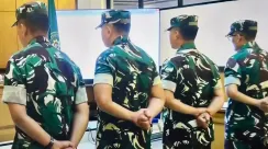 prajurit penyiram air keras