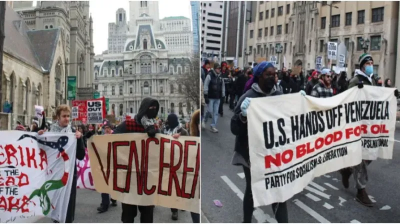 Massa demonstran berpawai dari Balai Kota Philadelphia ke Pusat Pertahanan militer AS di Spring Garden Street sambil membawa poster memprotes serangan militer Amerika Serikat di Venezuela.